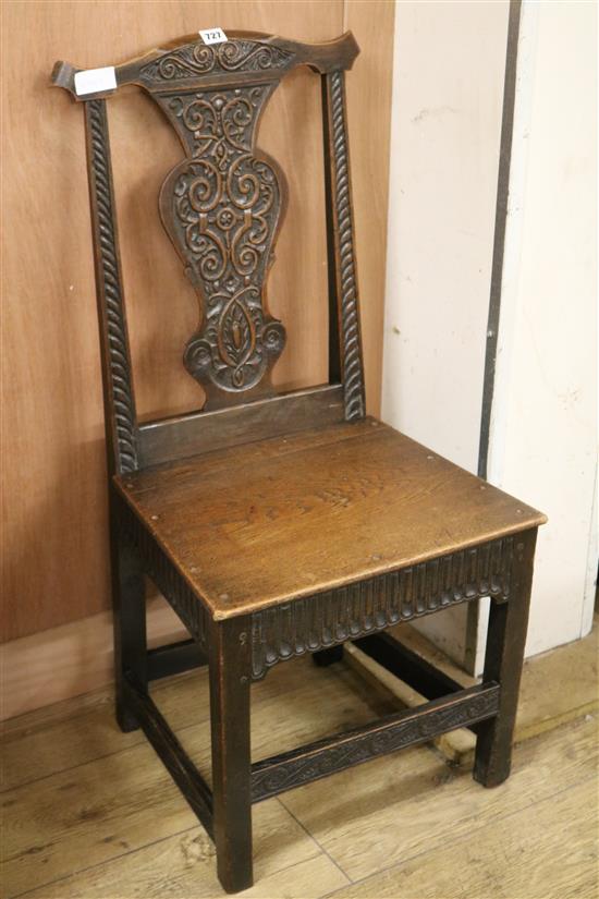 A carved side chair